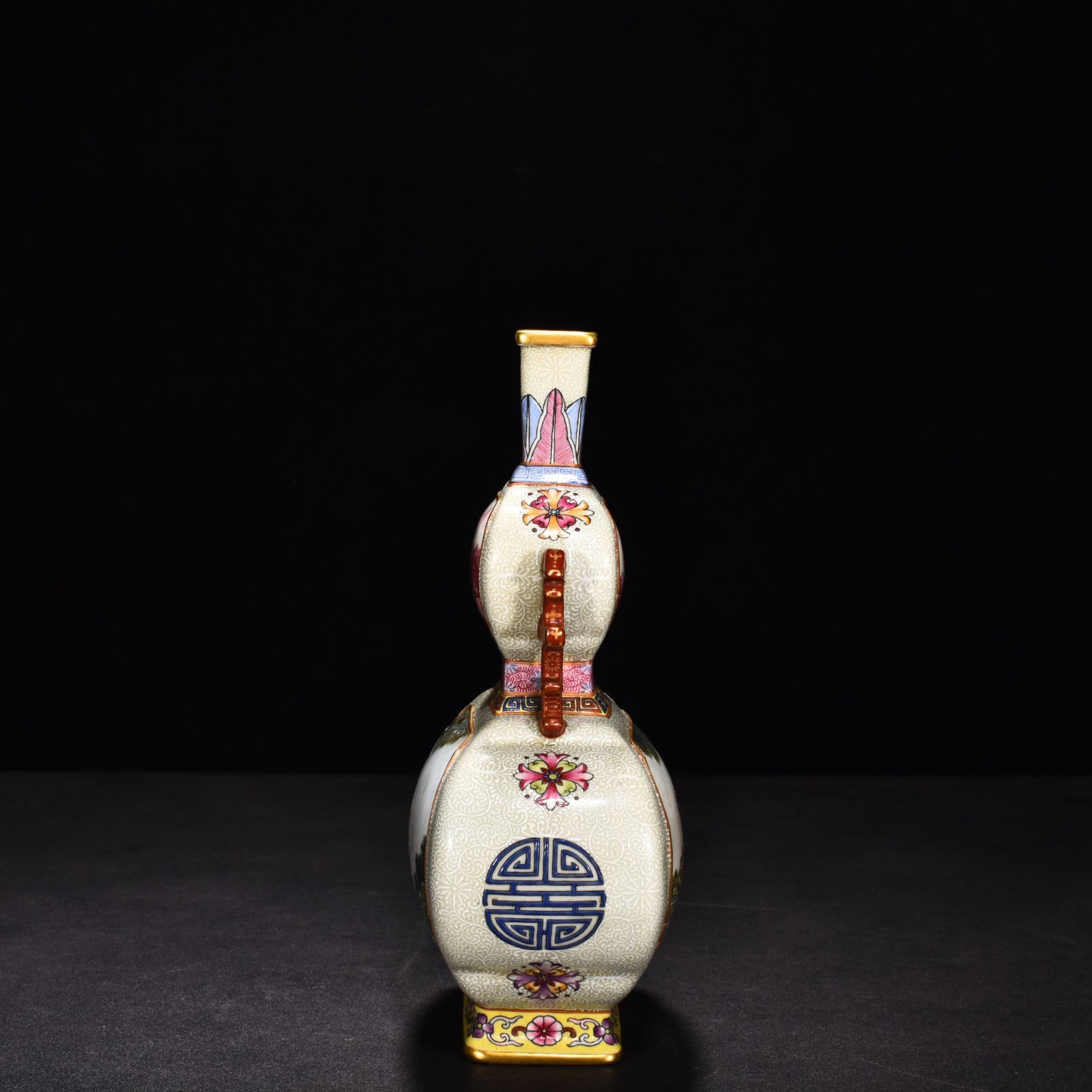 Qing Dynasty Qianlong enamel windowed Western figure binaural flat vase