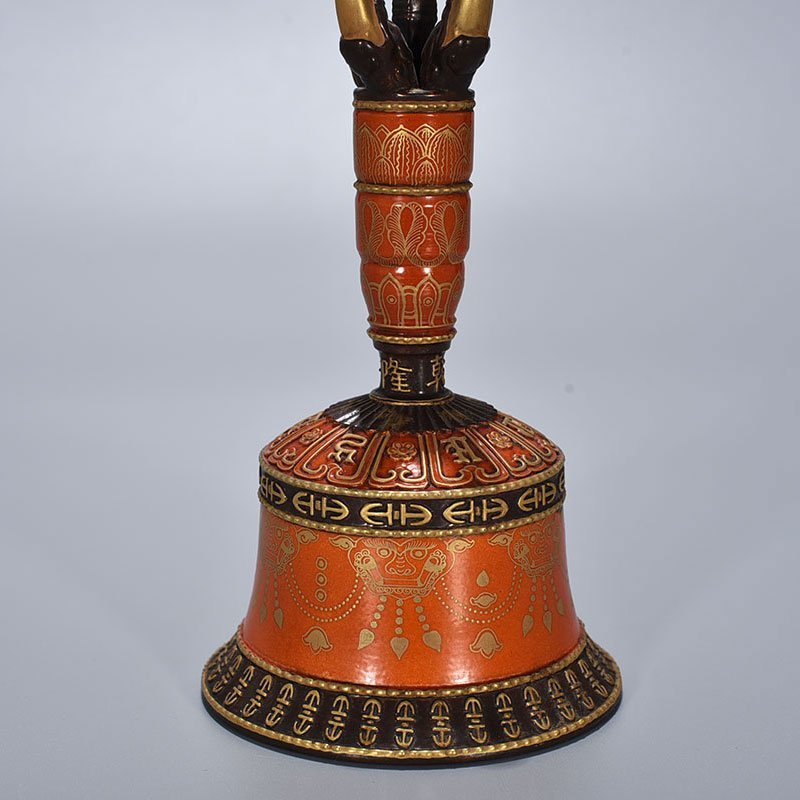 Qing Dynasty Qianlong Sanskrit rattles carved with gold on alum red ground