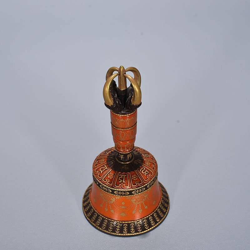 Qing Dynasty Qianlong Sanskrit rattles carved with gold on alum red ground