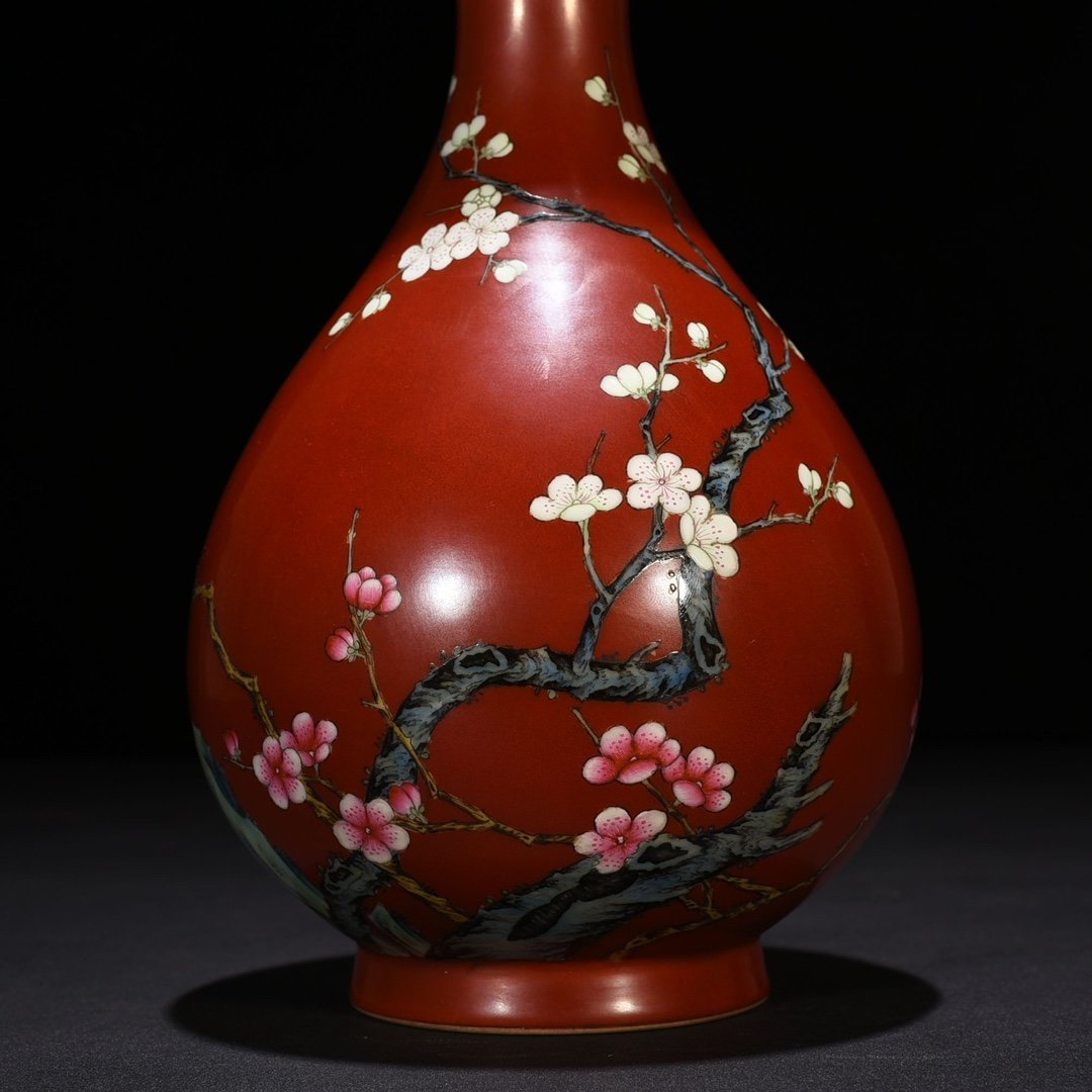 Qing Dynasty Qianlong alum red ground pastel plum jade pot spring vase