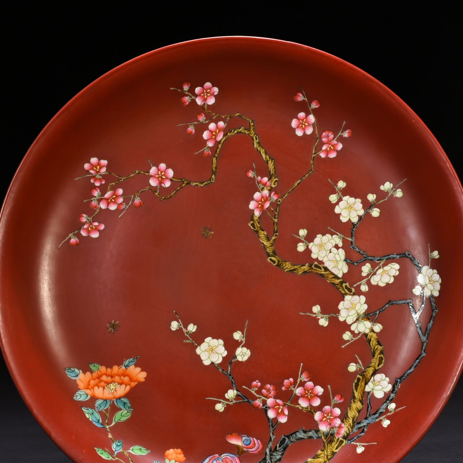 Qing Dynasty Qianlong alum red ground pastel flower plate