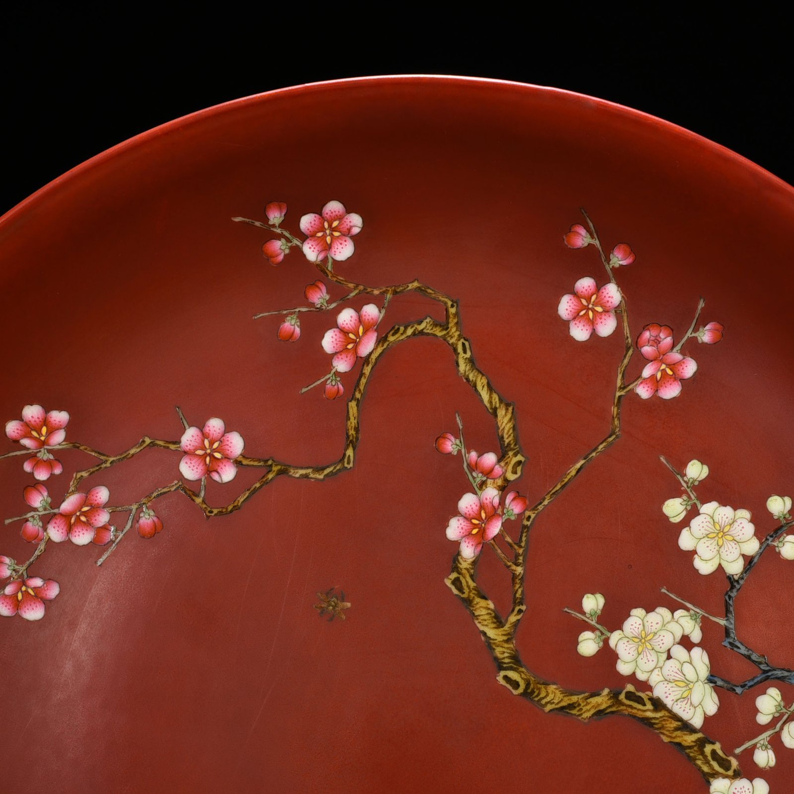 Qing Dynasty Qianlong alum red ground pastel flower plate