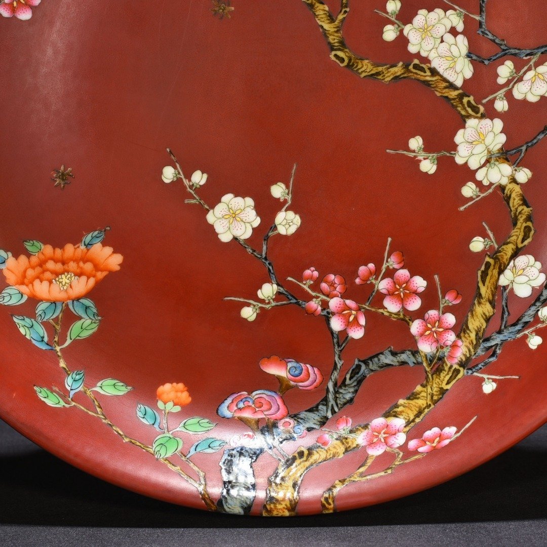 Qing Dynasty Qianlong alum red ground pastel flower plate