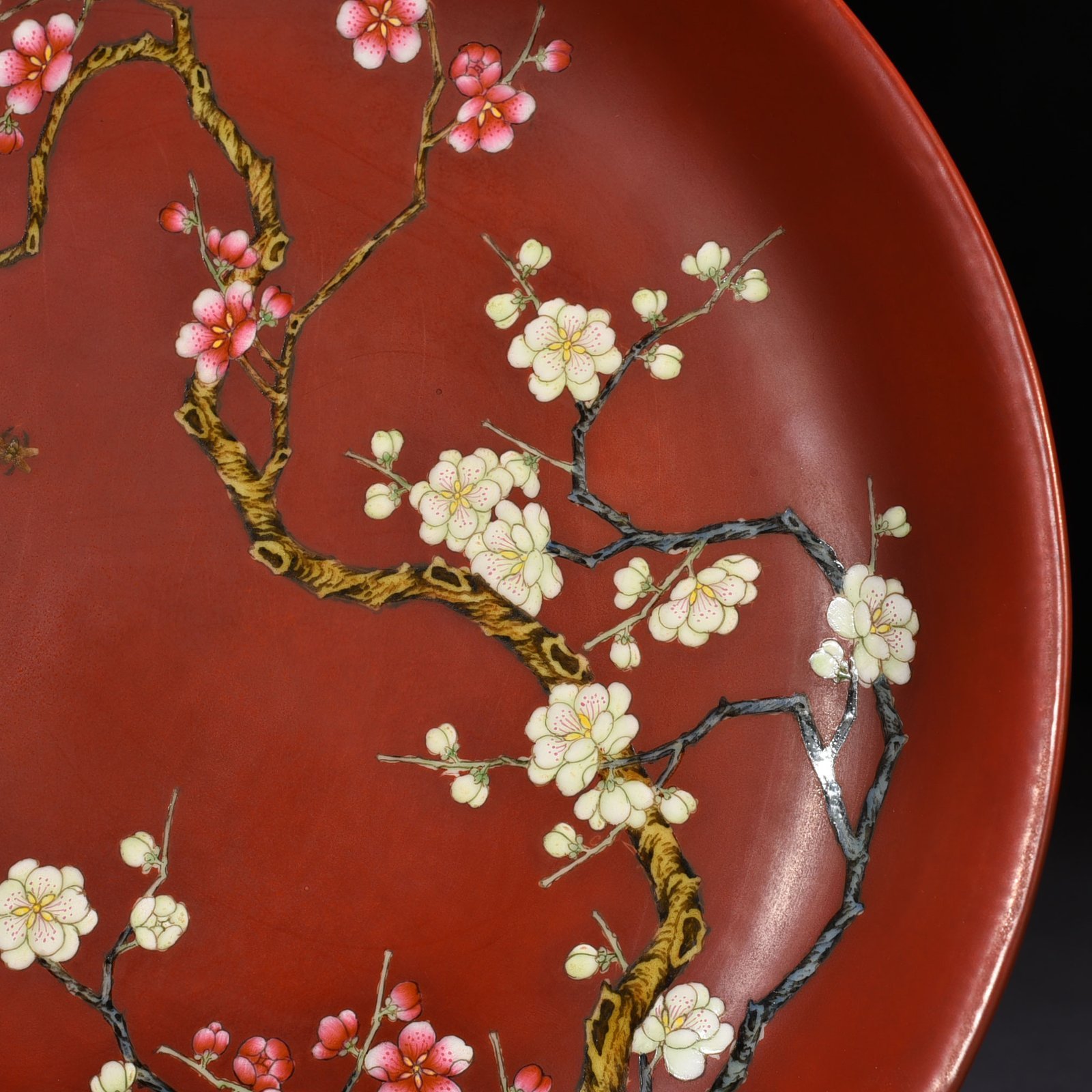 Qing Dynasty Qianlong alum red ground pastel flower plate