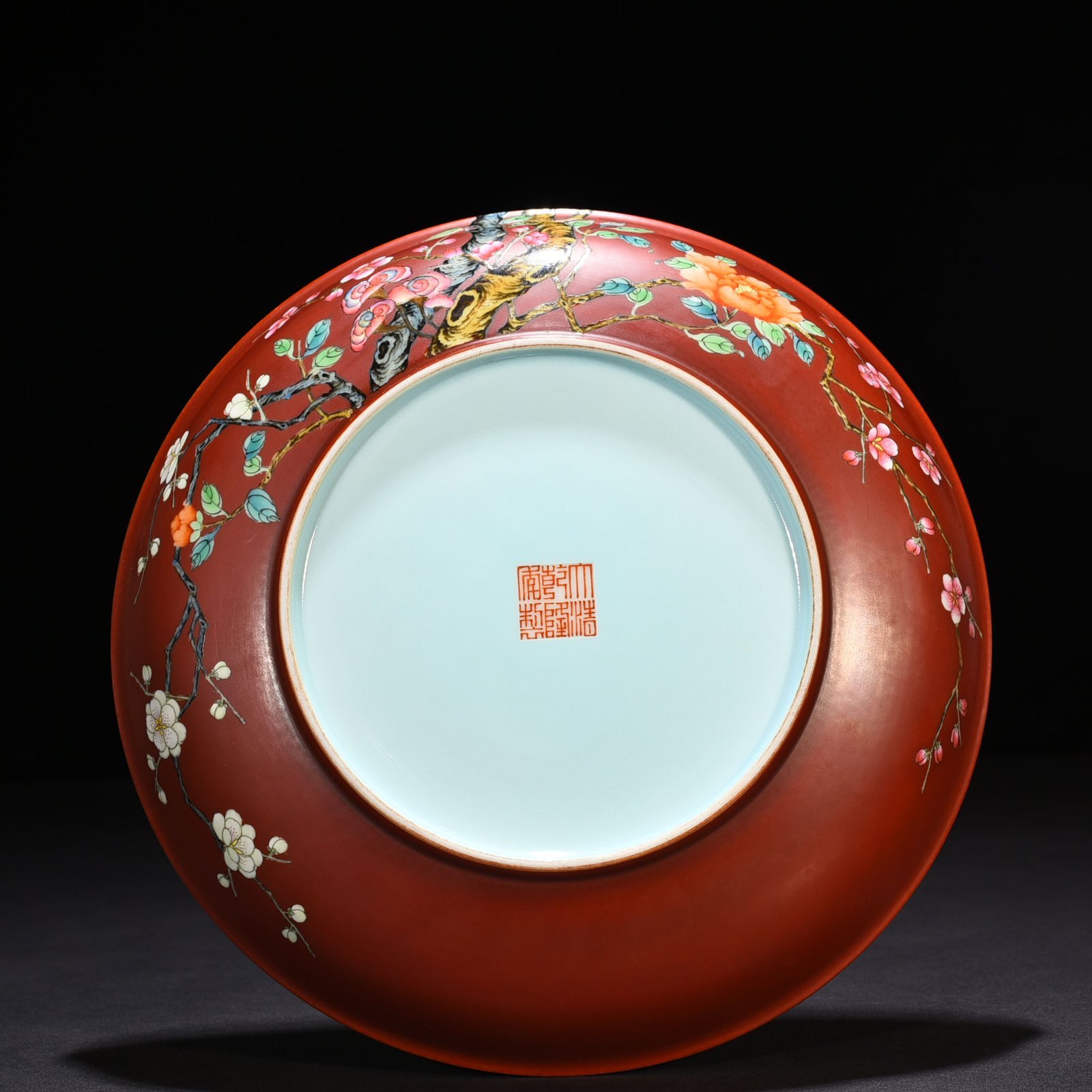 Qing Dynasty Qianlong alum red ground pastel flower plate