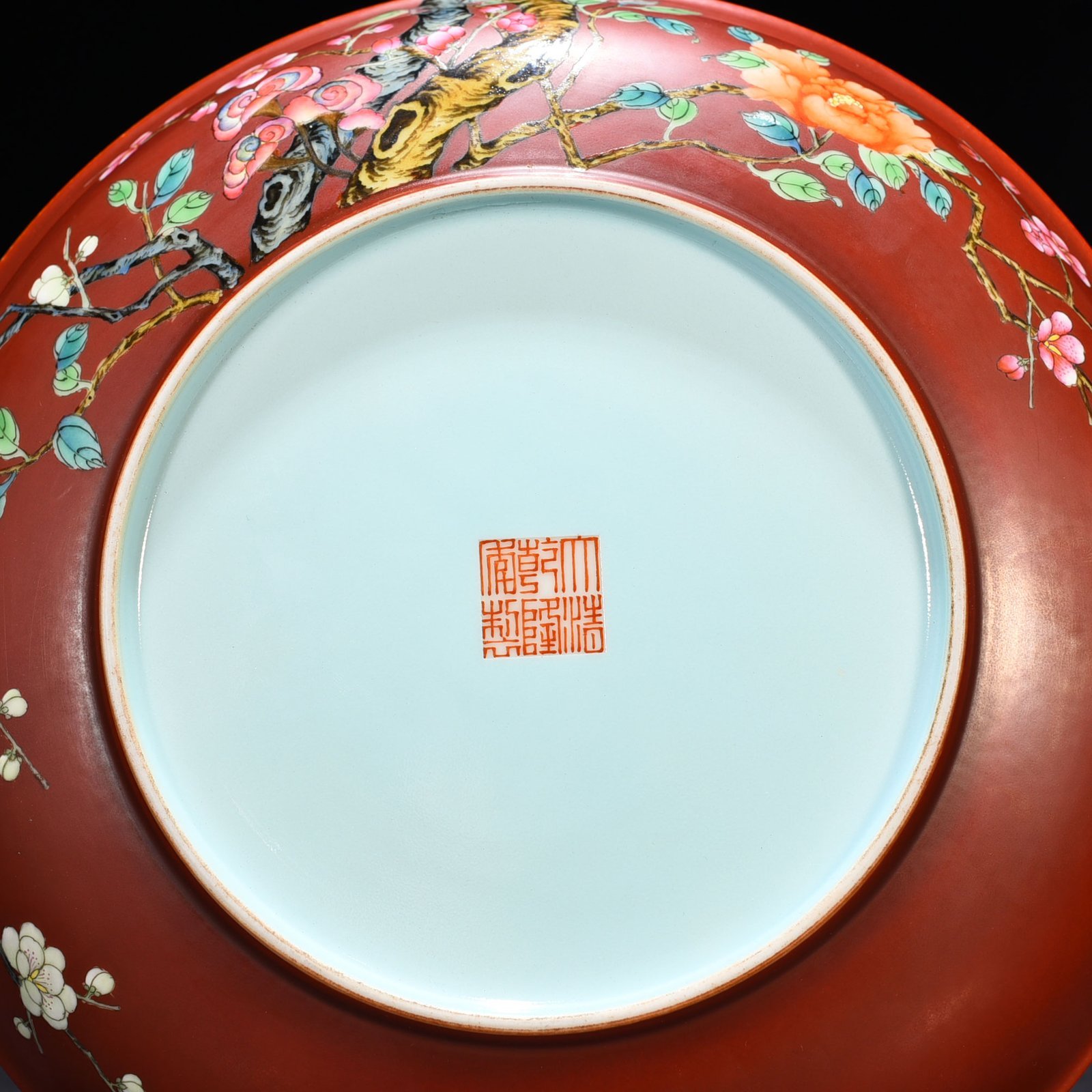 Qing Dynasty Qianlong alum red ground pastel flower plate
