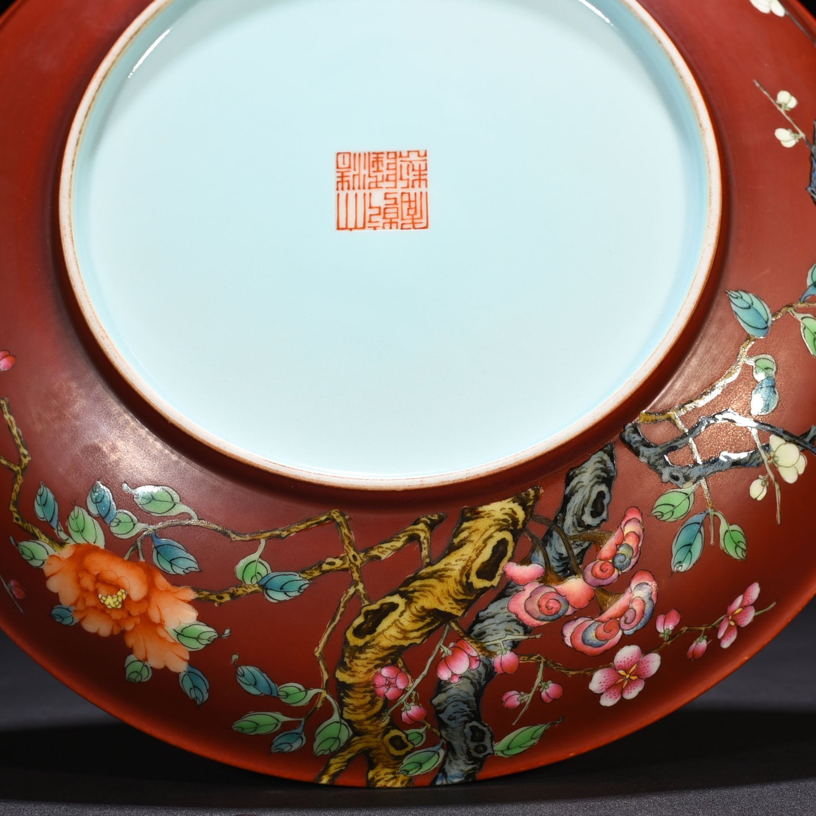 Qing Dynasty Qianlong alum red ground pastel flower plate