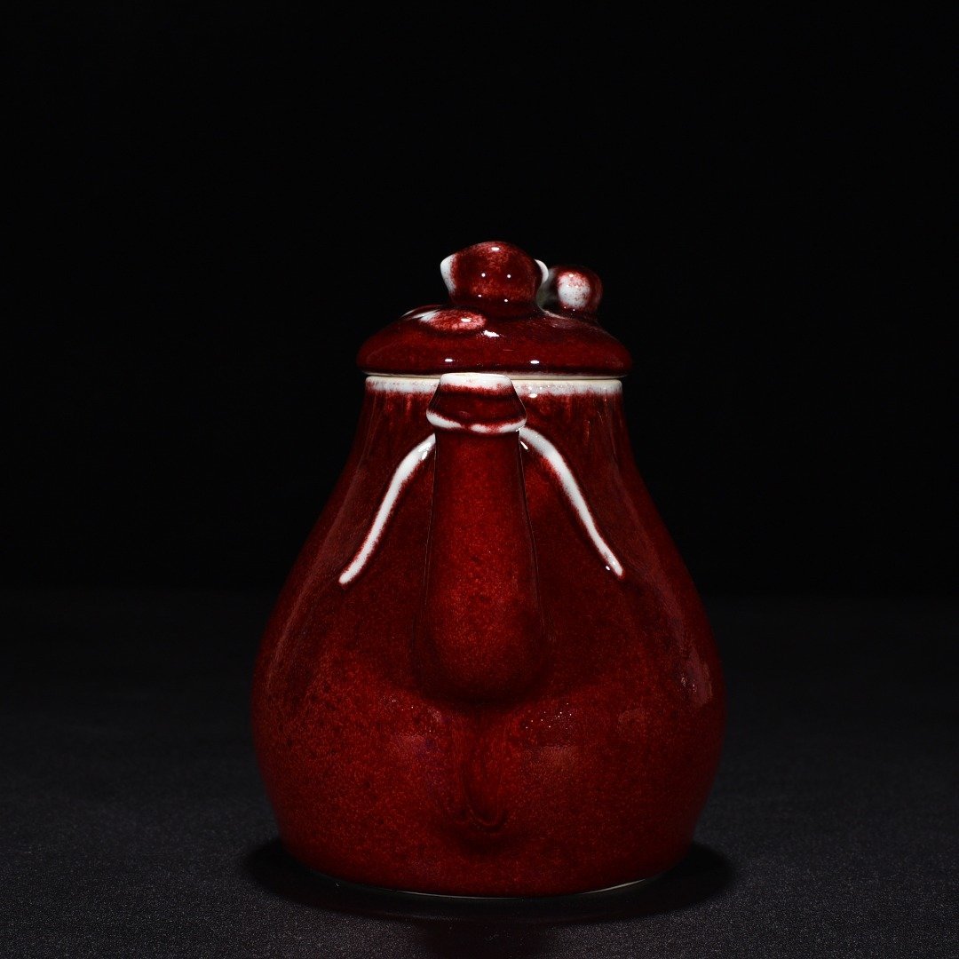Qing Dynasty Qianlong sacrifice red glaze pot with many children many blessings and many lives
