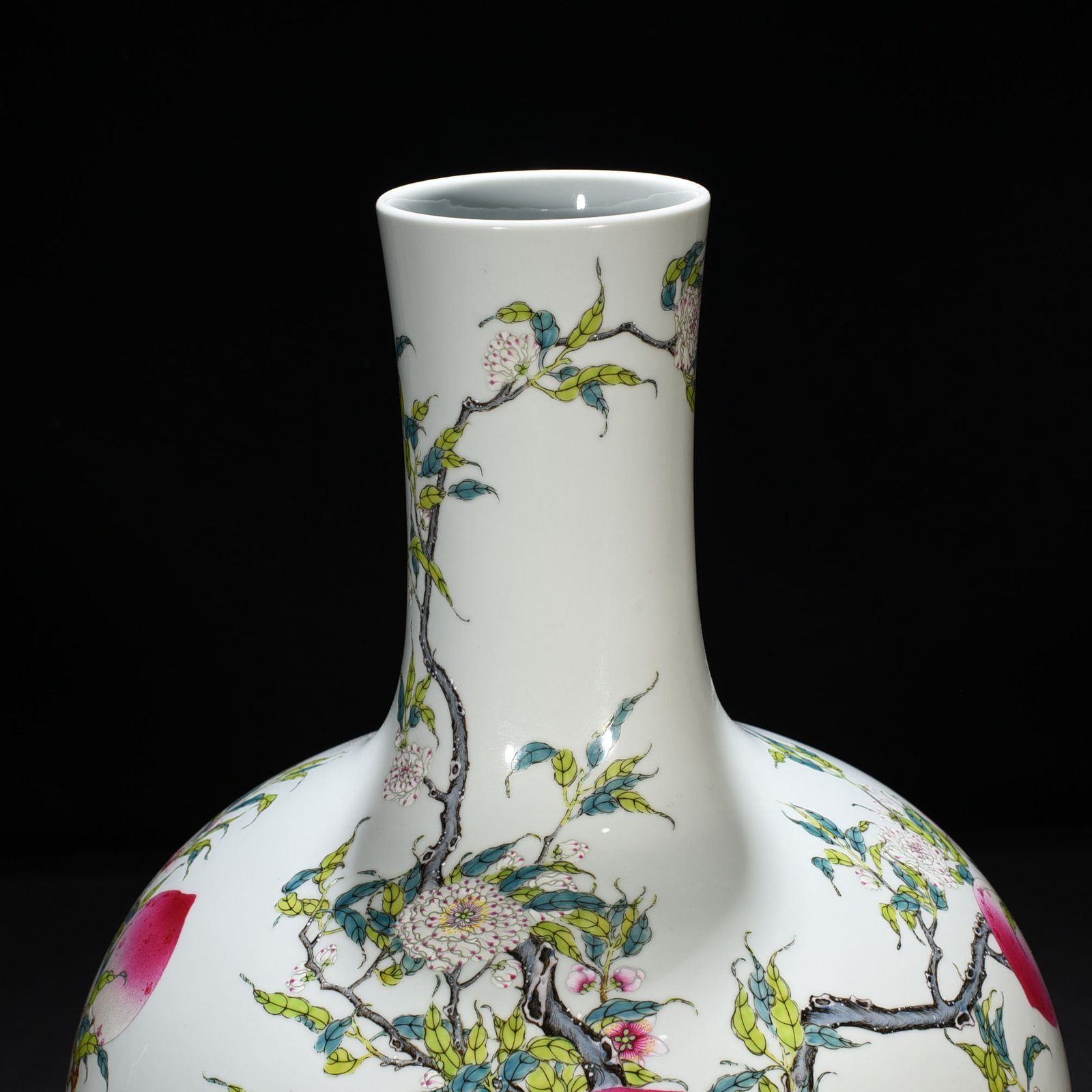 Qing Dynasty Qianlong famille rose nine-peach celestial sphere vase