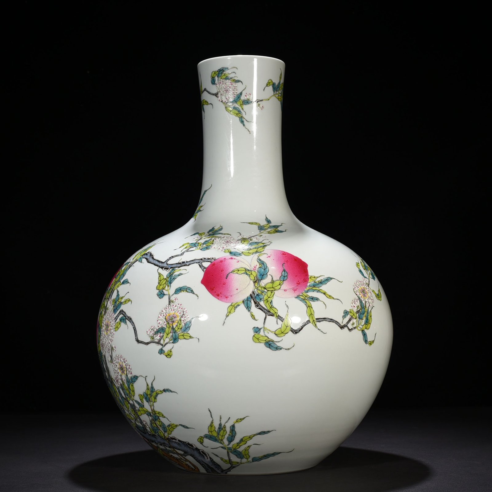 Qing Dynasty Qianlong famille rose nine-peach celestial sphere vase