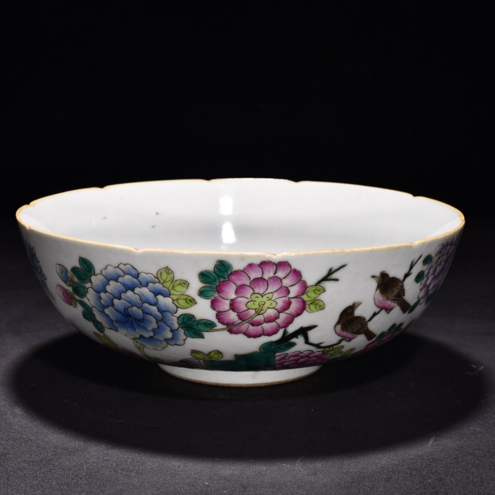 Qing Dynasty Qianlong pastel flower and bird bowl