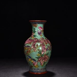 Qing Dynasty Qianlong pastel carved butterfly love and flower baggage vase