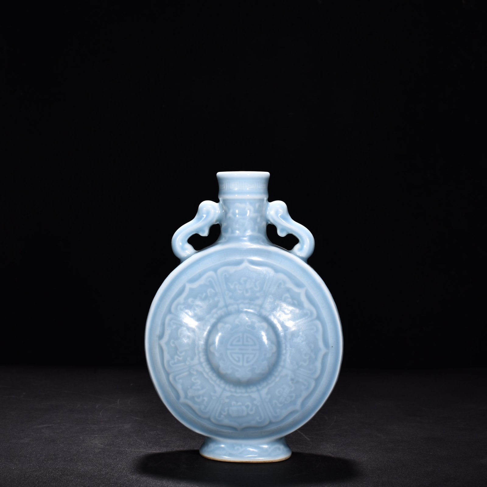 Qing Dynasty Qianlong pink celadon glaze eight-treasure double-eared flat bottle