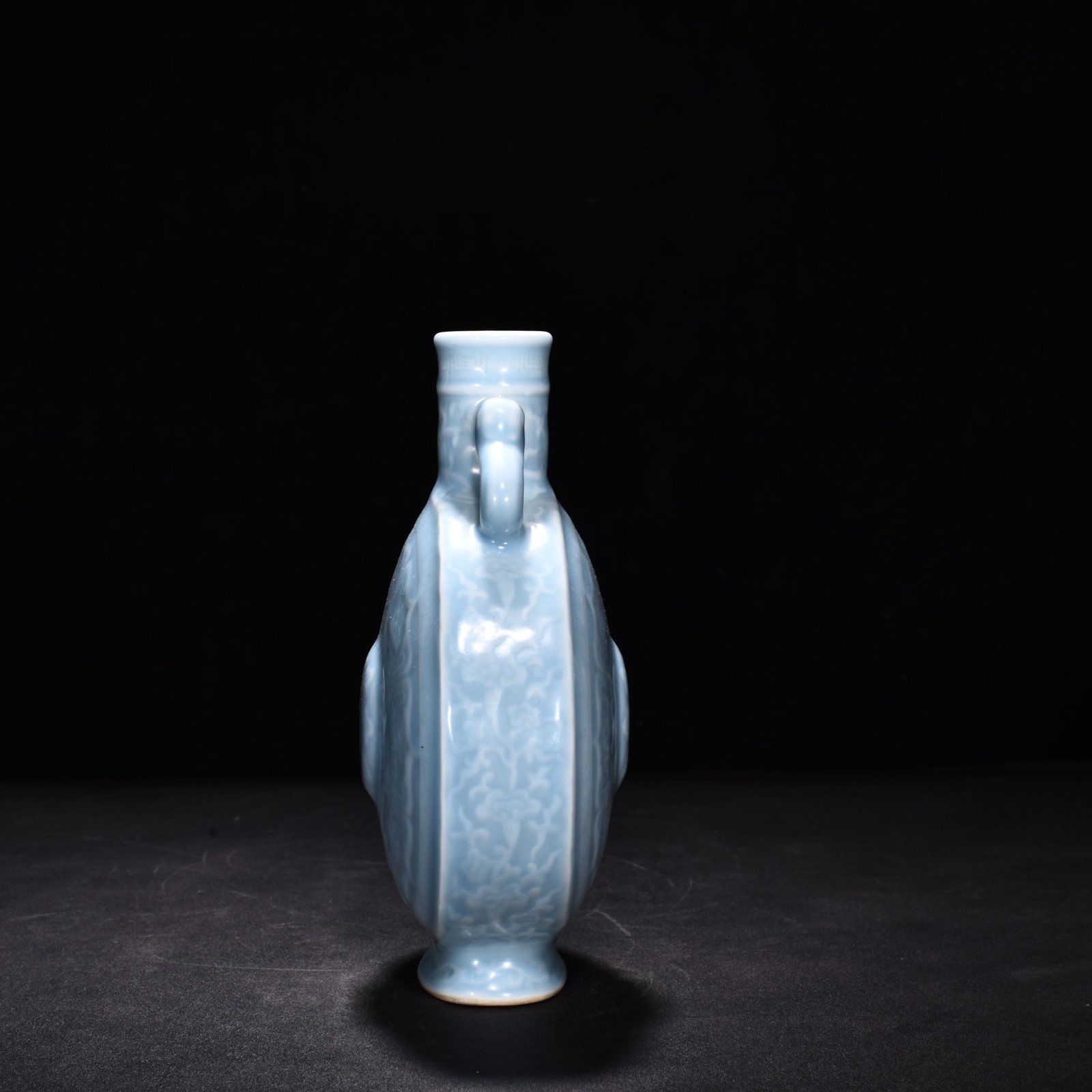 Qing Dynasty Qianlong pink celadon glaze eight-treasure double-eared flat bottle
