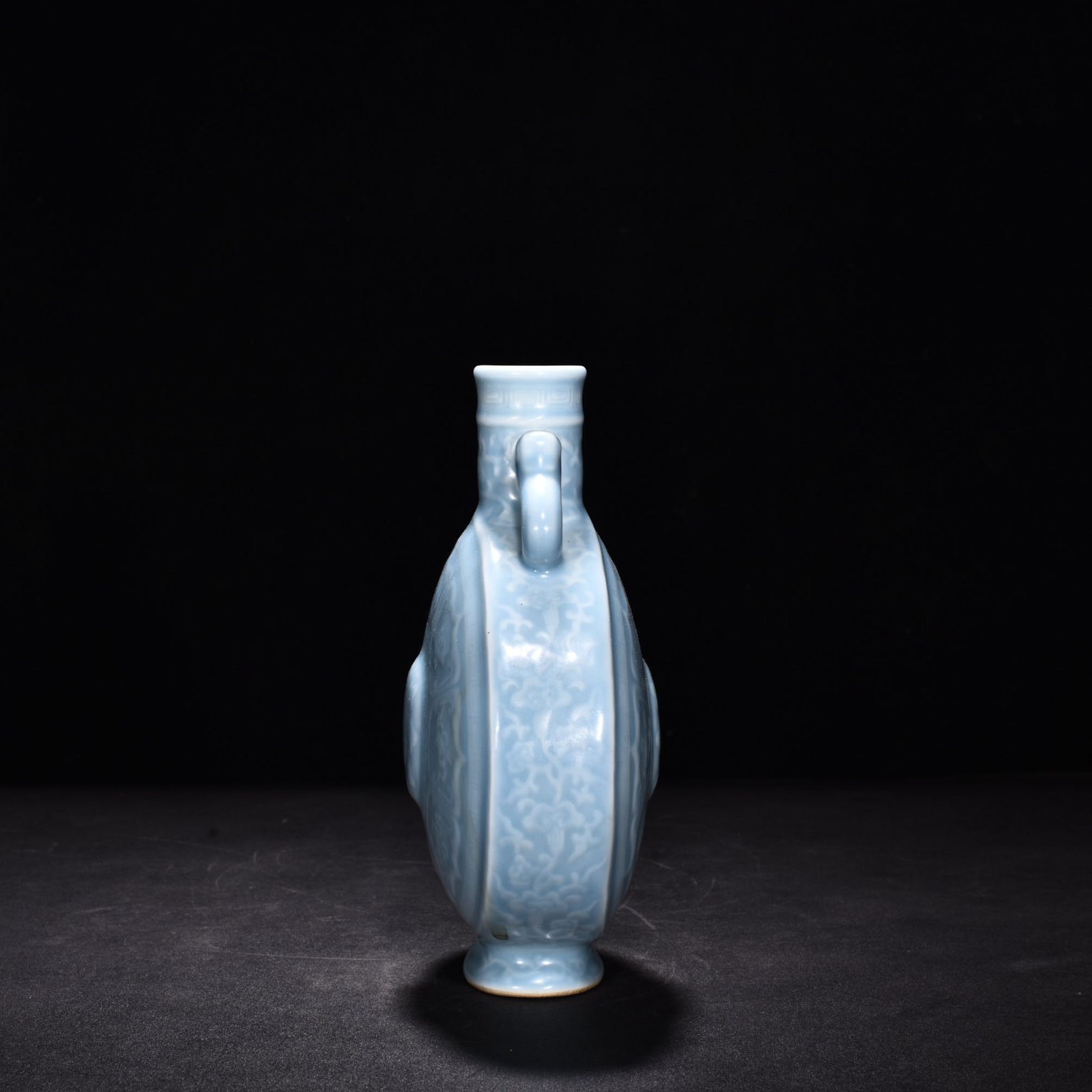 Qing Dynasty Qianlong pink celadon glaze eight-treasure double-eared flat bottle