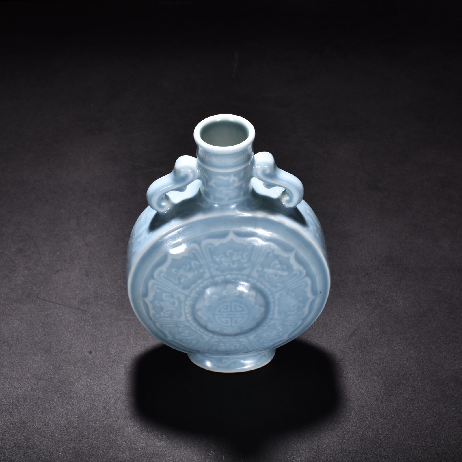 Qing Dynasty Qianlong pink celadon glaze eight-treasure double-eared flat bottle