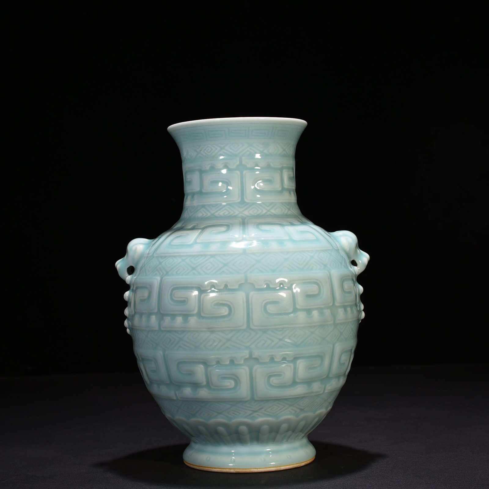 Qing Dynasty Qianlong pink celadon glazed animal ear vase
