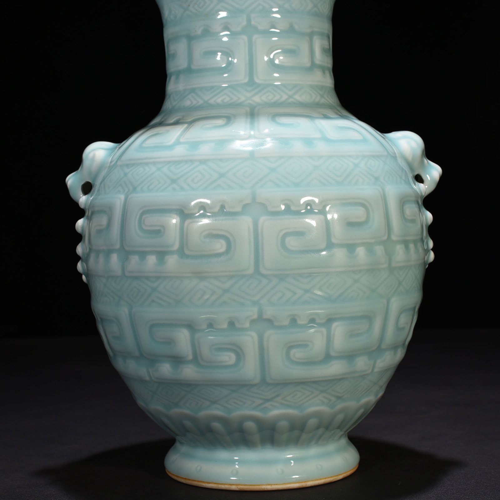 Qing Dynasty Qianlong pink celadon glazed animal ear vase