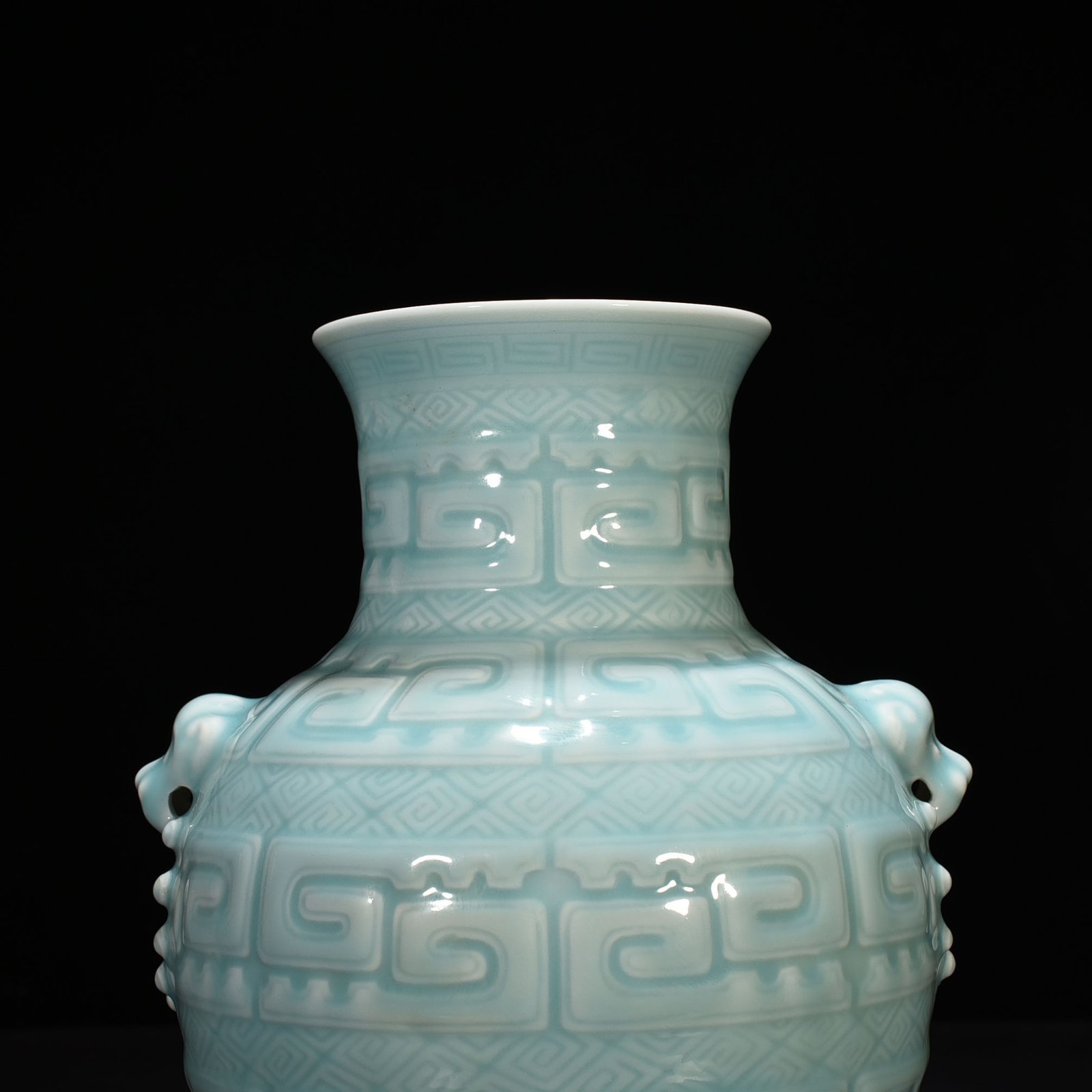 Qing Dynasty Qianlong pink celadon glazed animal ear vase