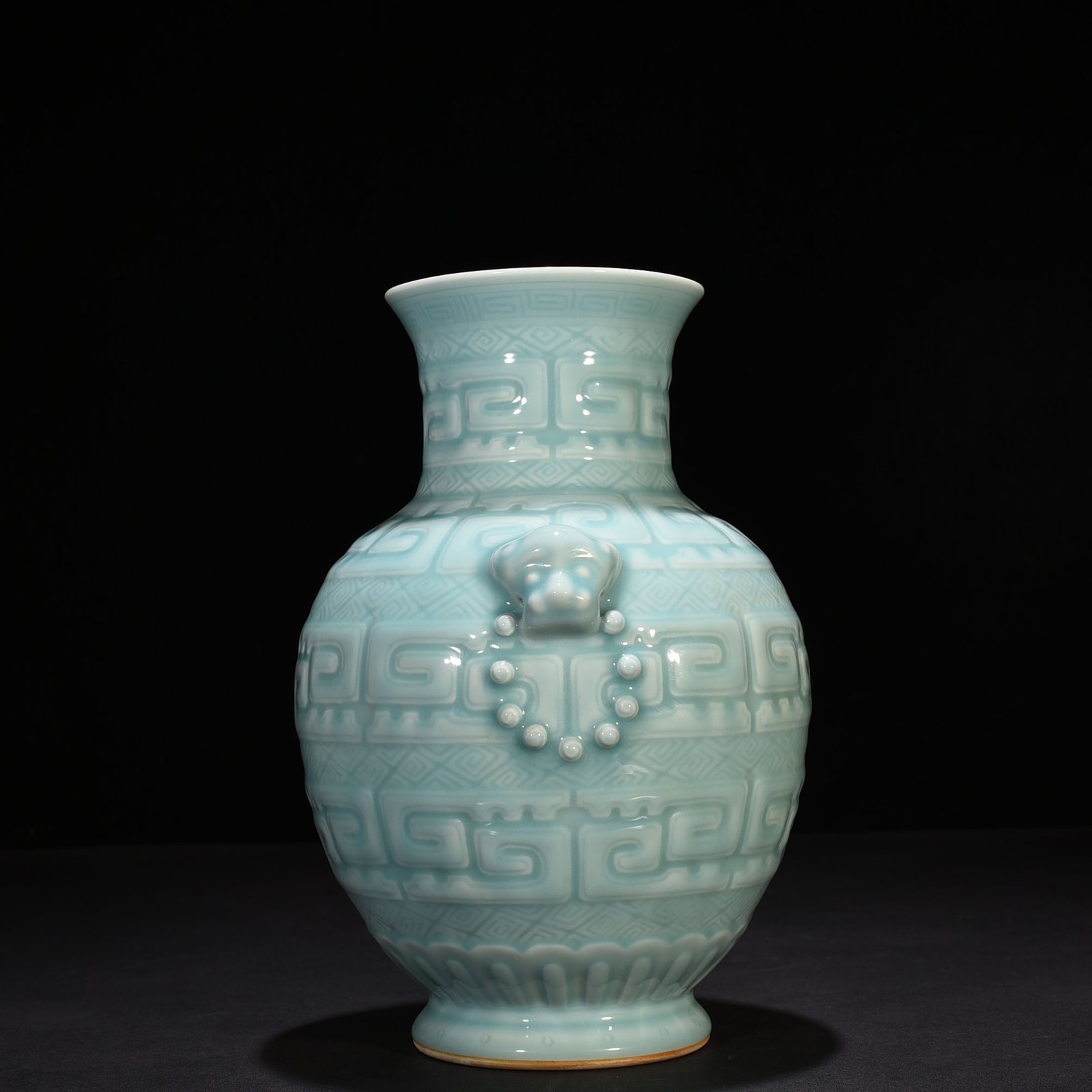 Qing Dynasty Qianlong pink celadon glazed animal ear vase