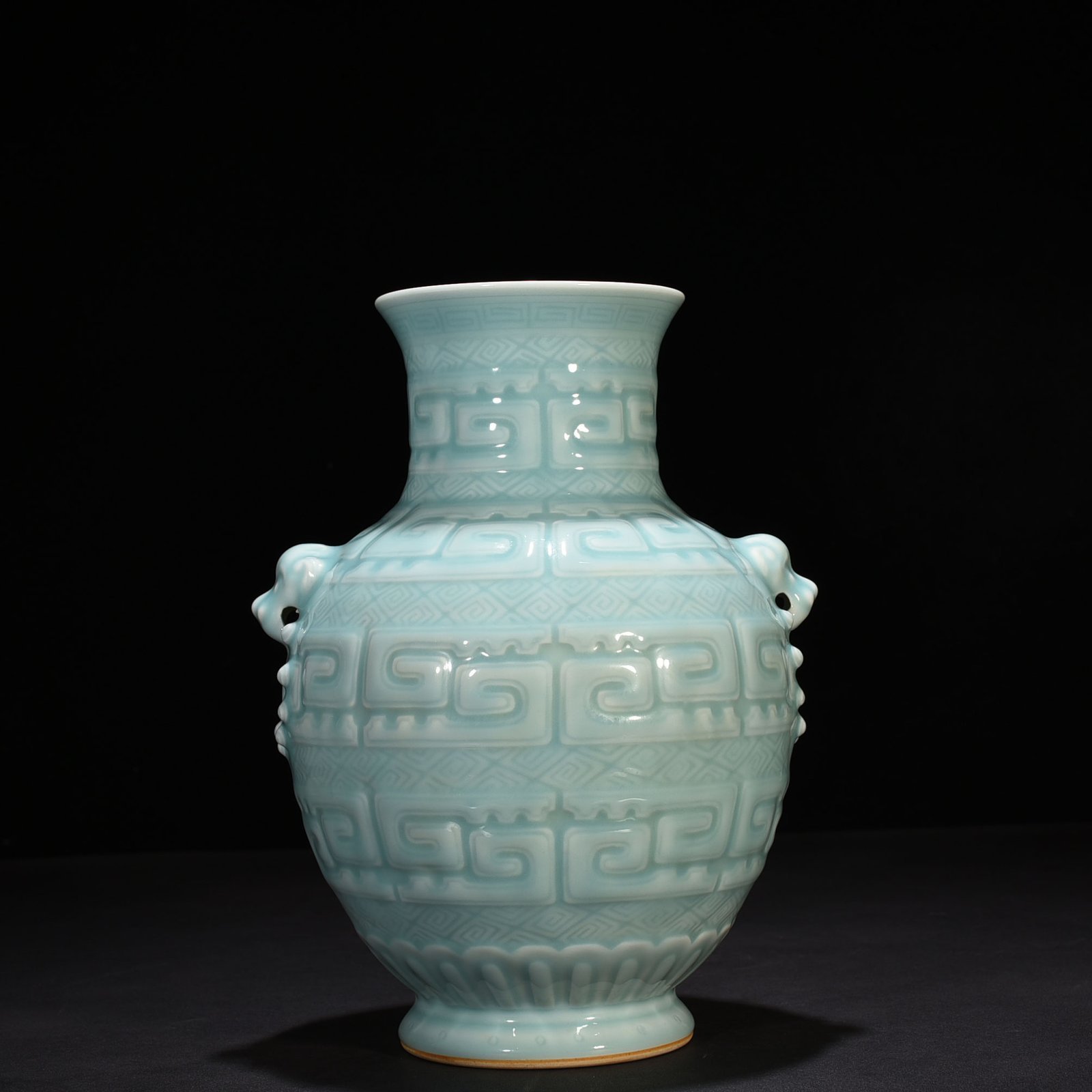 Qing Dynasty Qianlong pink celadon glazed animal ear vase