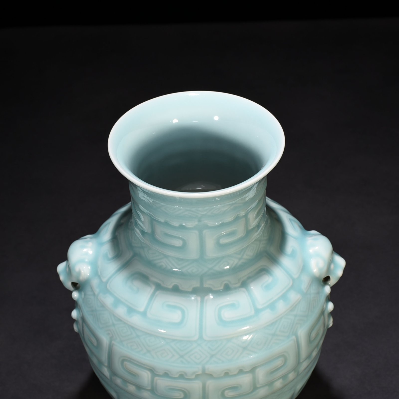 Qing Dynasty Qianlong pink celadon glazed animal ear vase