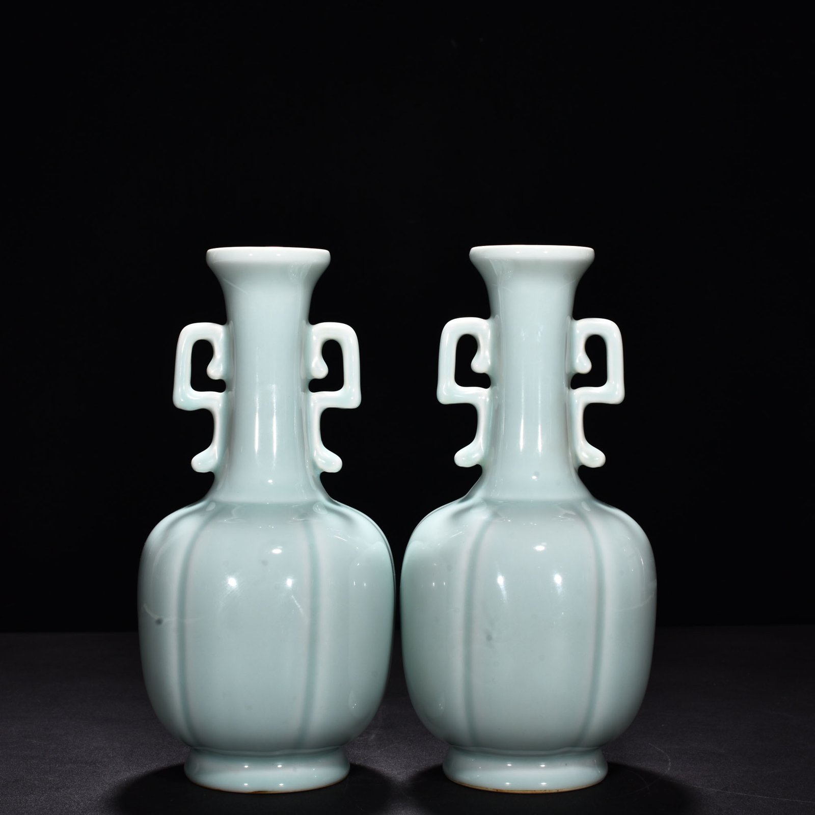 Qing Dynasty Qianlong pink celadon glaze scraped edge amphorae