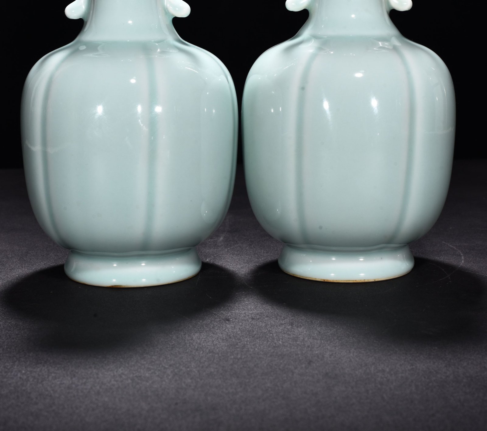 Qing Dynasty Qianlong pink celadon glaze scraped edge amphorae