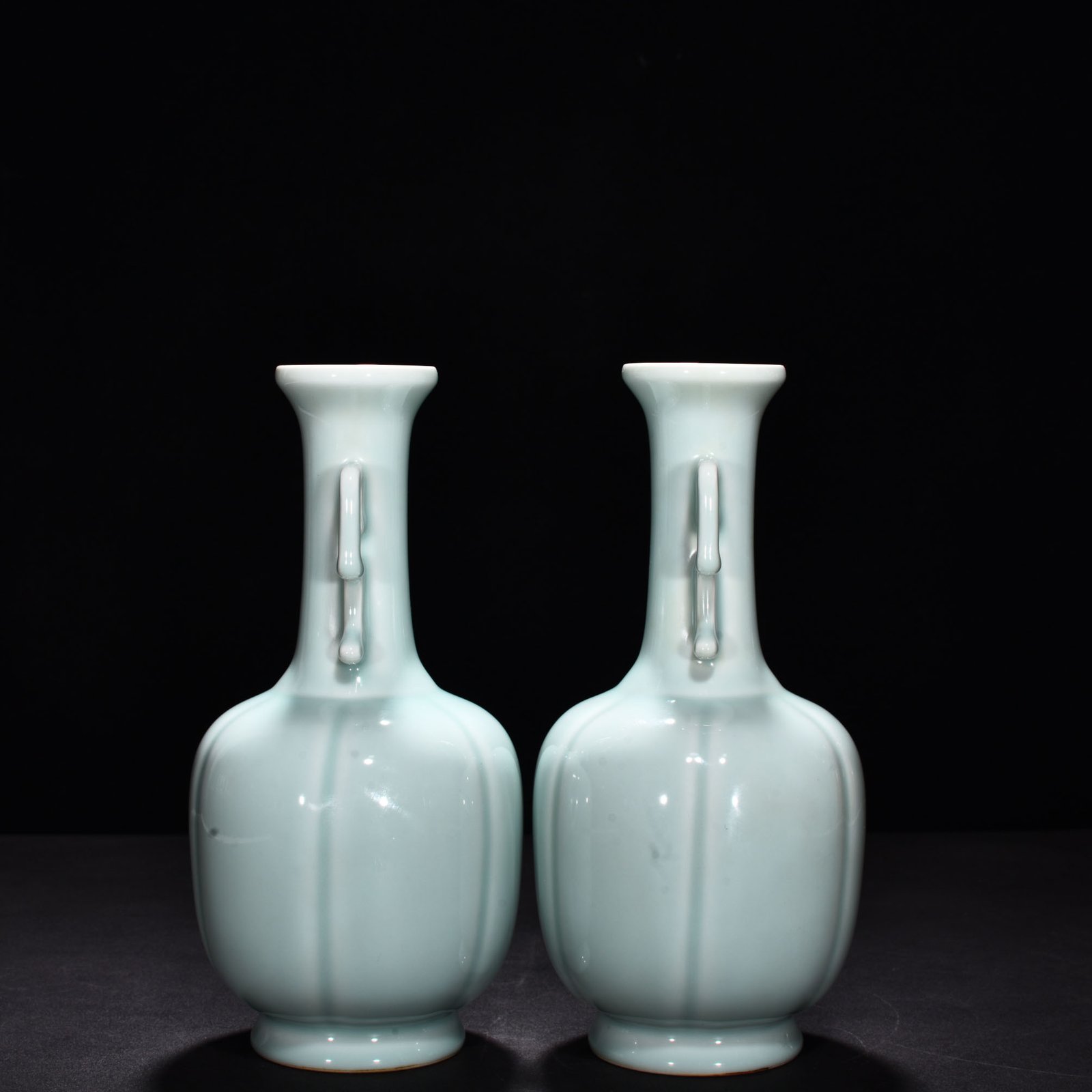 Qing Dynasty Qianlong pink celadon glaze scraped edge amphorae