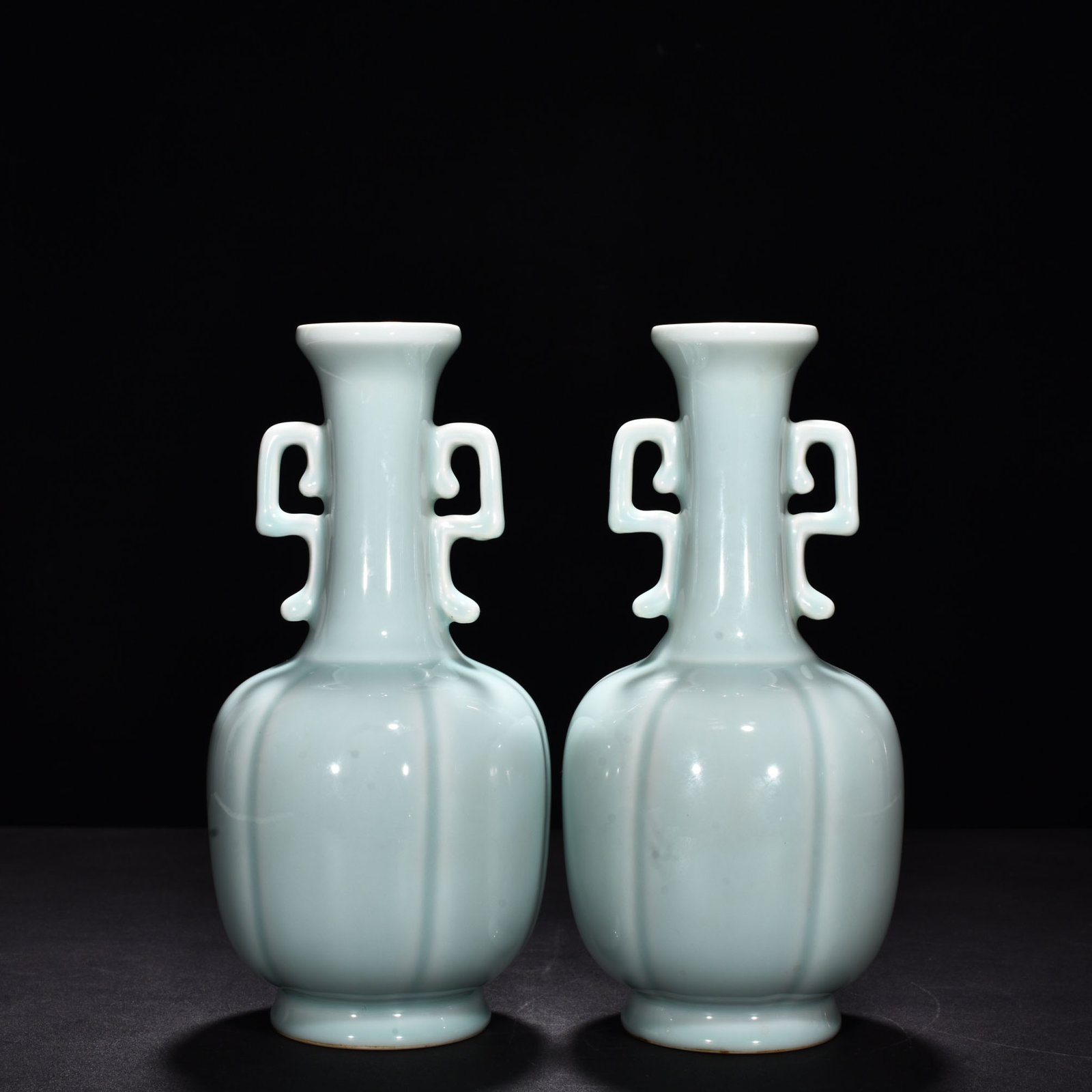 Qing Dynasty Qianlong pink celadon glaze scraped edge amphorae