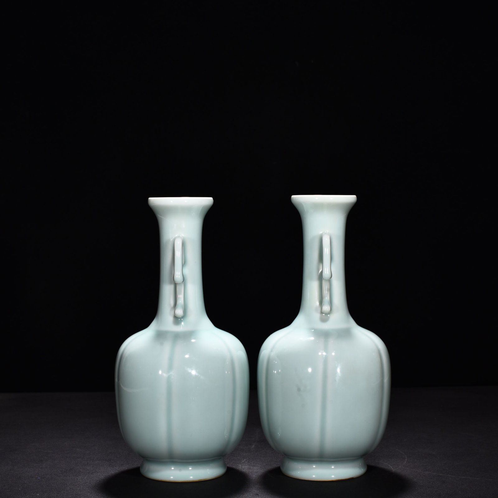 Qing Dynasty Qianlong pink celadon glaze scraped edge amphorae
