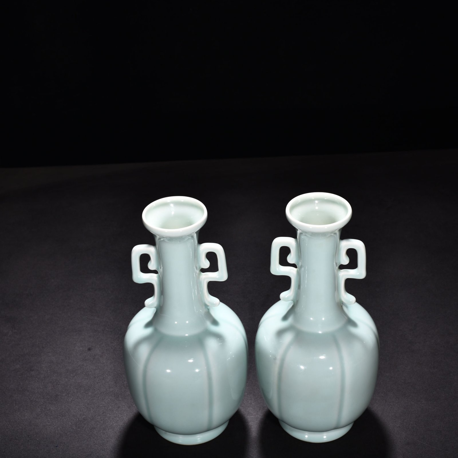 Qing Dynasty Qianlong pink celadon glaze scraped edge amphorae