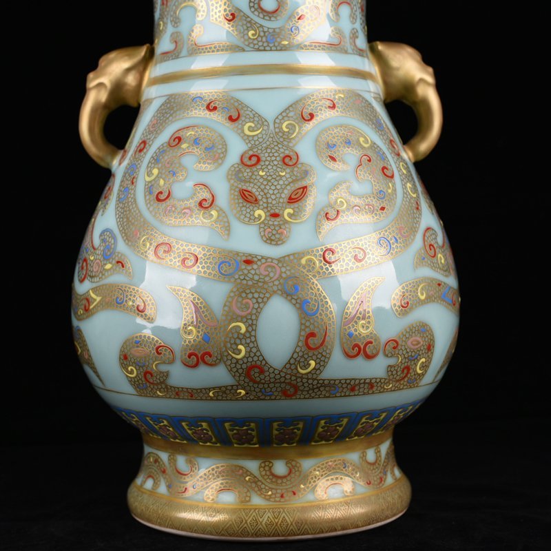 Qing Dynasty Qianlong pink celadon glaze double-eared statue with gold dragon