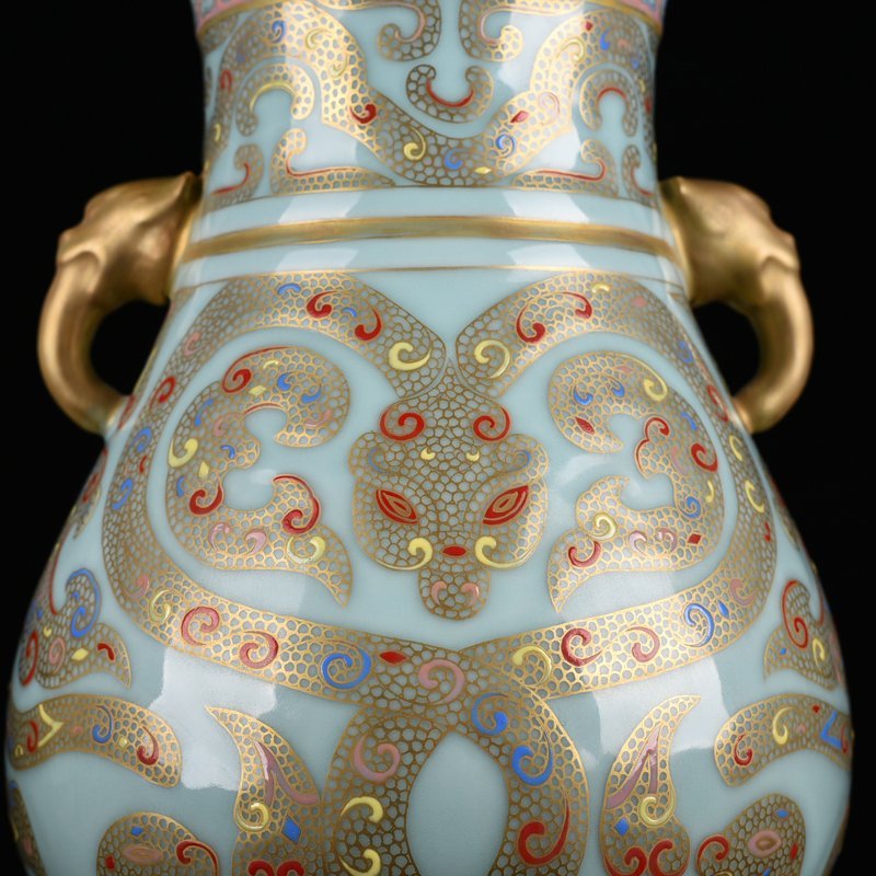 Qing Dynasty Qianlong pink celadon glaze double-eared statue with gold dragon