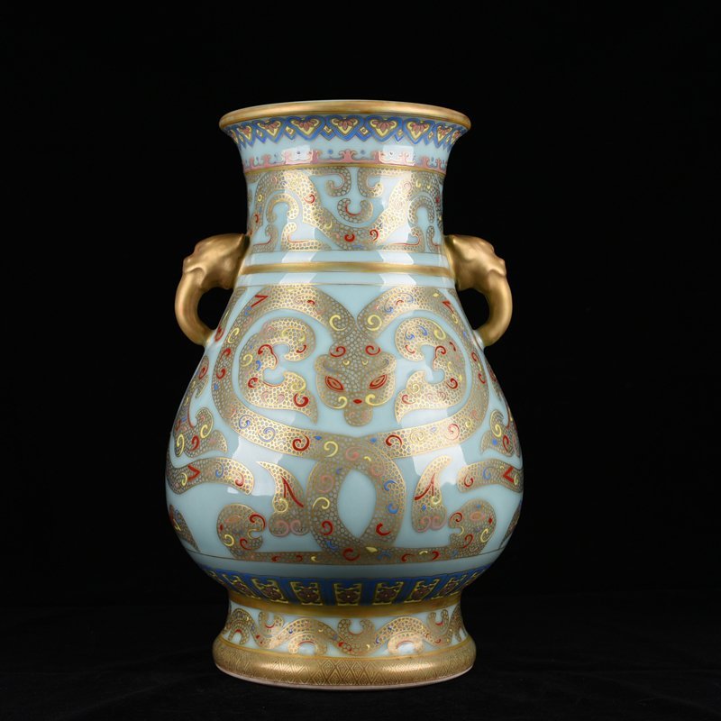 Qing Dynasty Qianlong pink celadon glaze double-eared statue with gold dragon