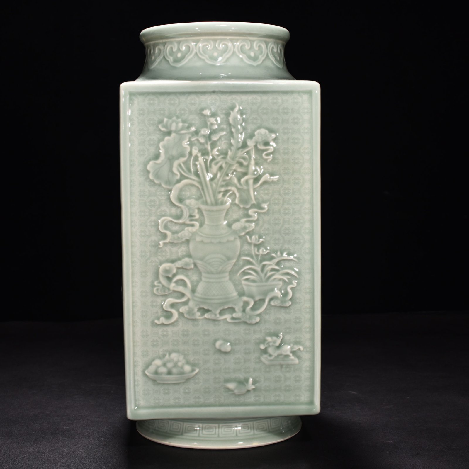 Qing Dynasty Qianlong pink celadon glaze carved ancient flower Cong style square vase