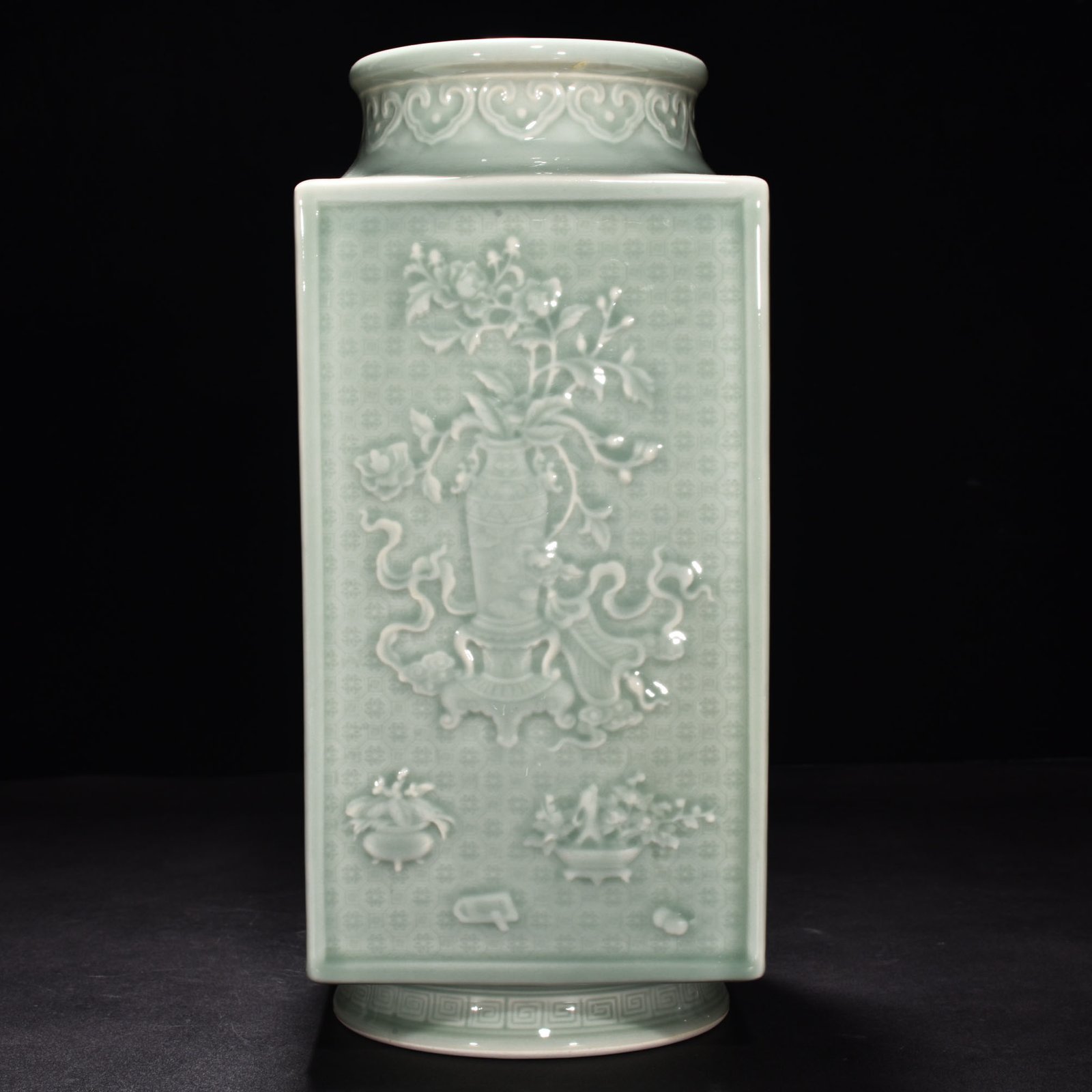 Qing Dynasty Qianlong pink celadon glaze carved ancient flower Cong style square vase