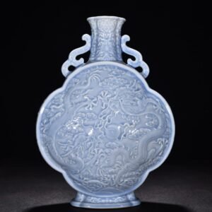 Qing Dynasty Qianlong pink celadon glaze flat bottle with carved double dragons