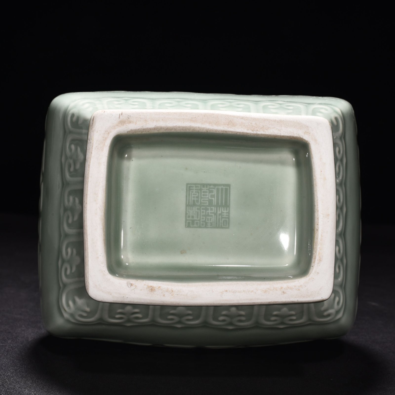 Qing Dynasty Qianlong pink celadon glaze carved Kui dragon through the ear vase