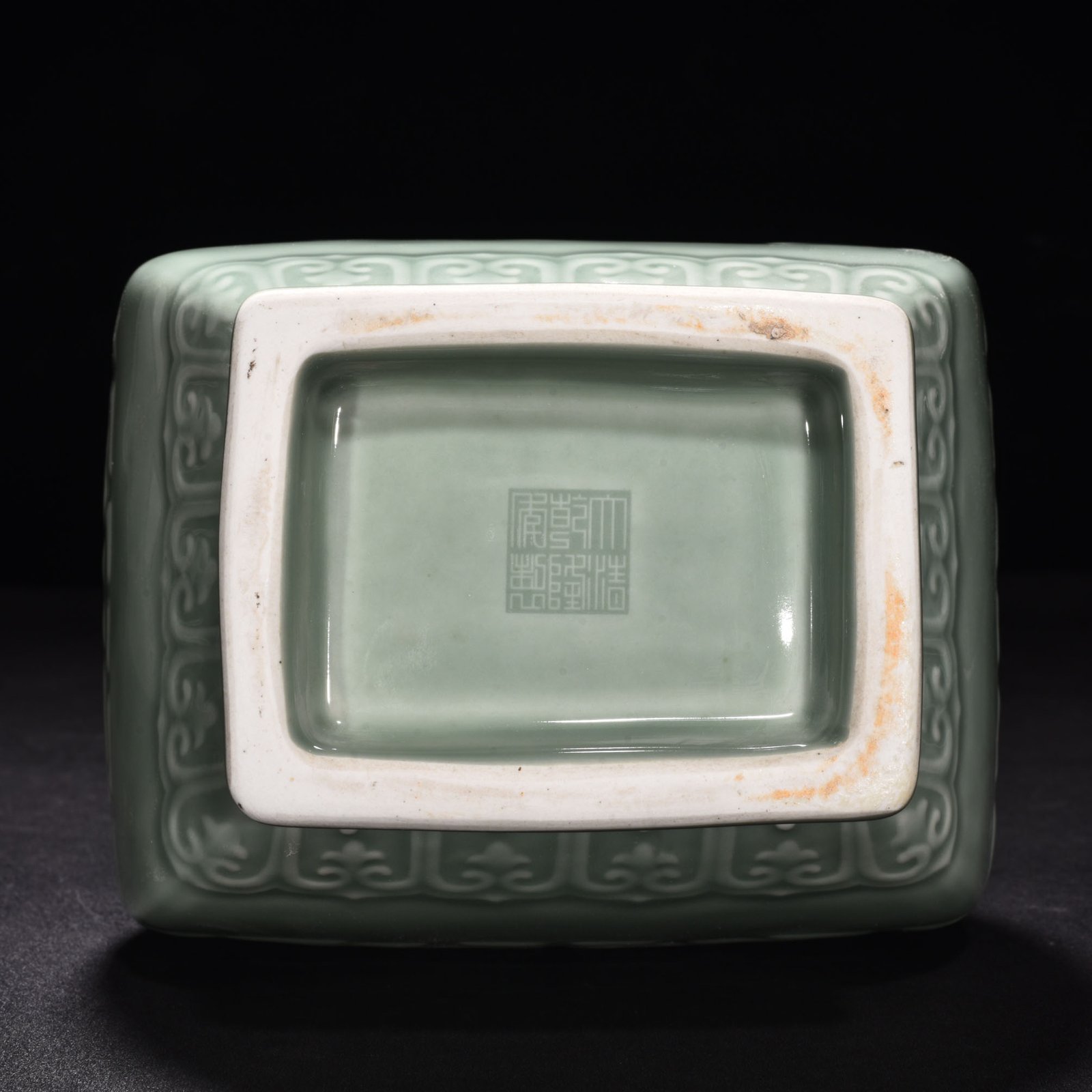 Qing Dynasty Qianlong pink celadon glaze carved Kui dragon through-ear bottle