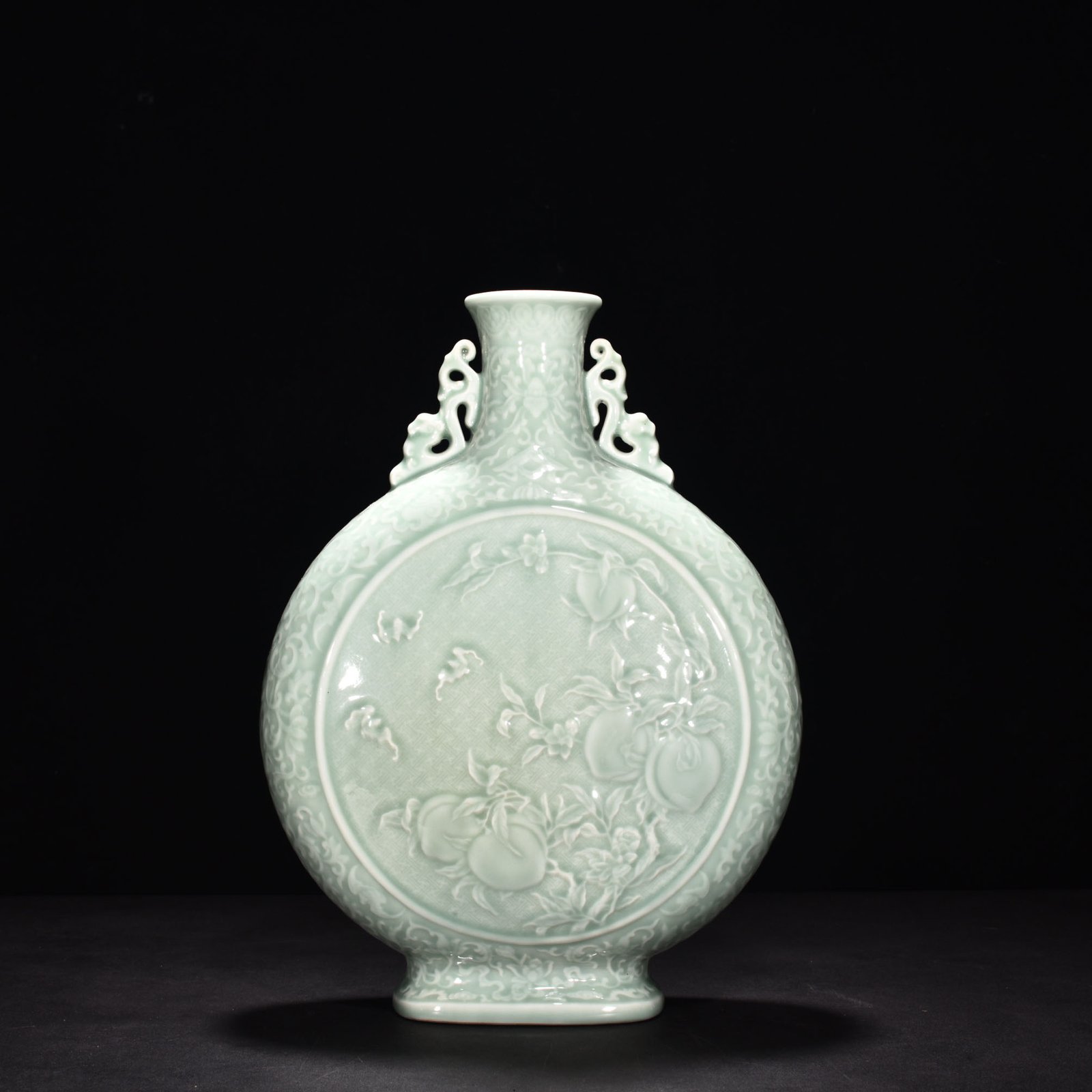 Qing Dynasty Qianlong pink celadon glaze carved flat vase with many children