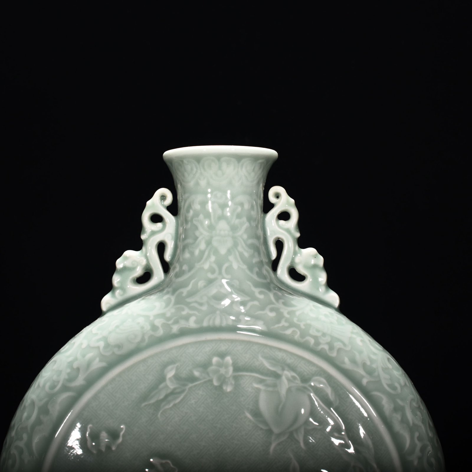 Qing Dynasty Qianlong pink celadon glaze carved flat vase with many children