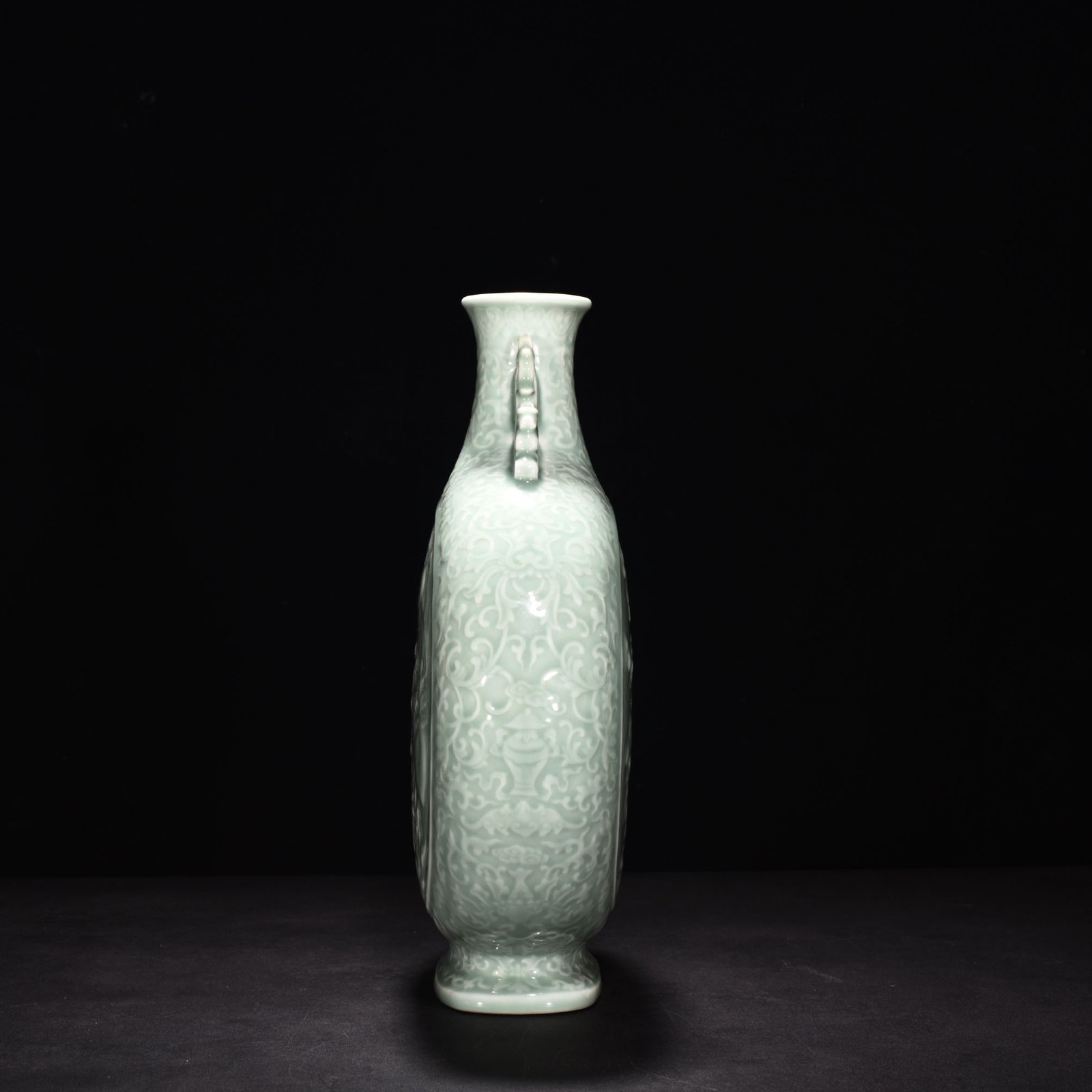 Qing Dynasty Qianlong pink celadon glaze carved flat vase with many children