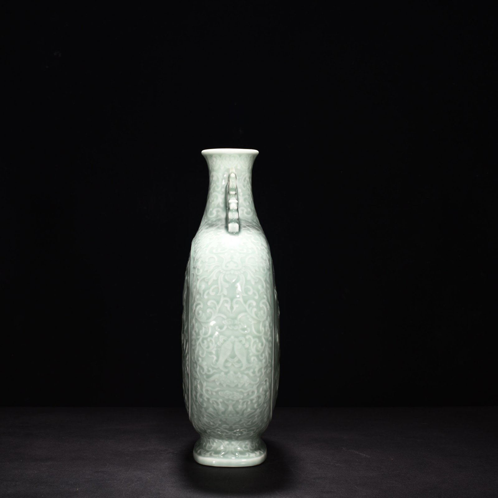 Qing Dynasty Qianlong pink celadon glaze carved flat vase with many children