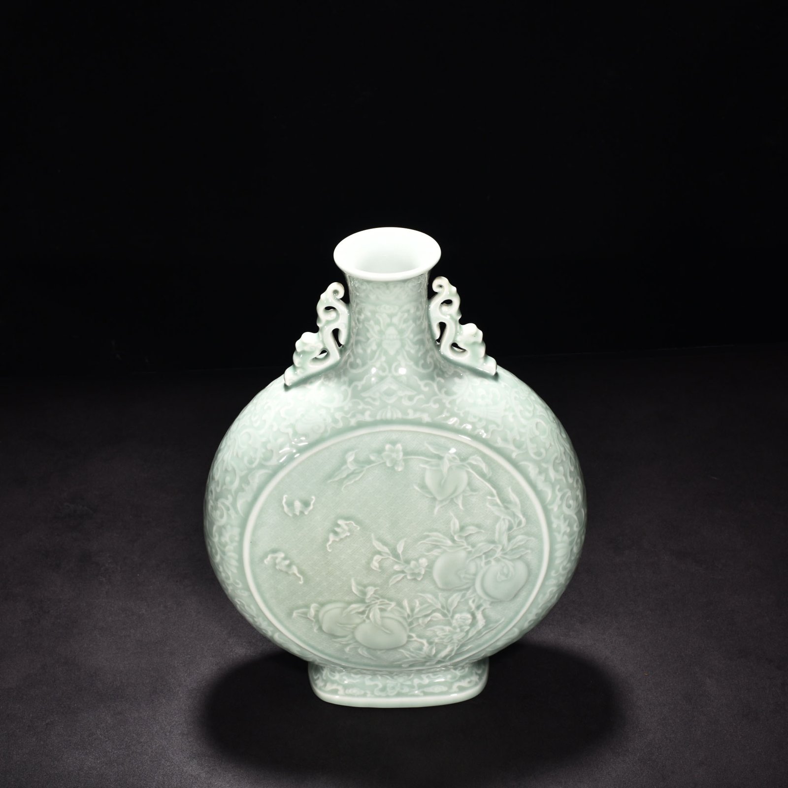 Qing Dynasty Qianlong pink celadon glaze carved flat vase with many children
