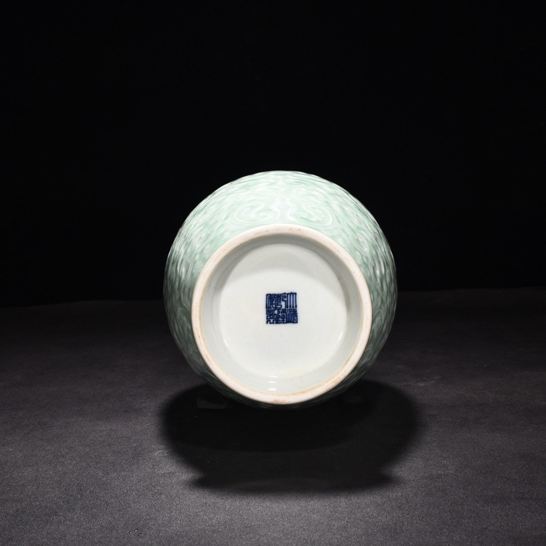 Qing Dynasty Qianlong pink celadon glaze carved dish vase with lotus