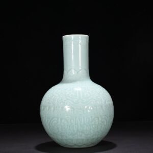 Qing Dynasty Qianlong pink celadon glaze carved Taotie celestial sphere vase