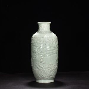Qing Dynasty Qianlong pink celadon glaze carved fish and dragon lantern bottle