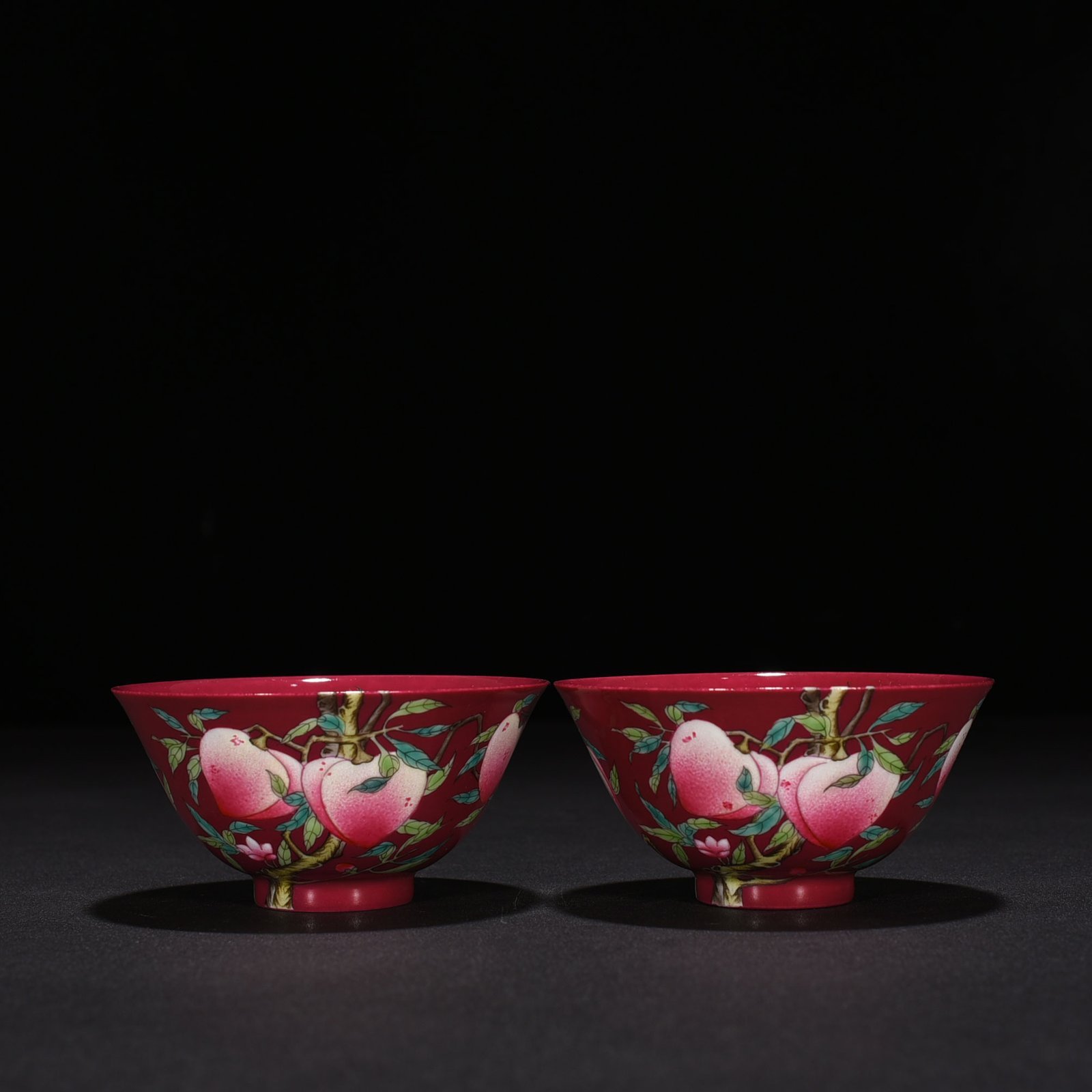 Qing Dynasty Qianlong rouge ground pastel colored cup