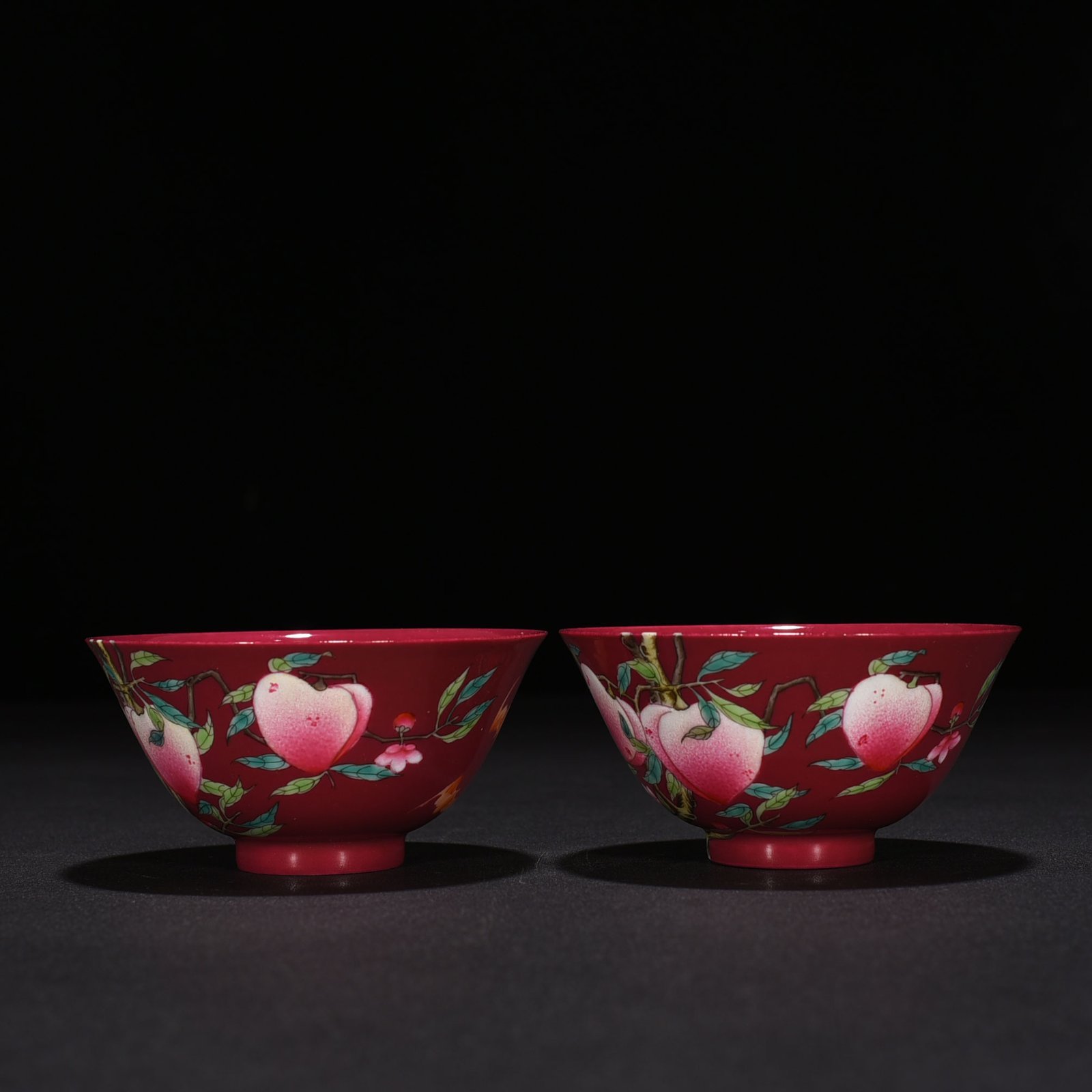 Qing Dynasty Qianlong rouge ground pastel colored cup